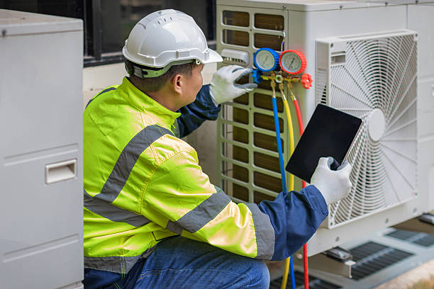 Professional Heat Pump Repair technician working in Sardis, TN